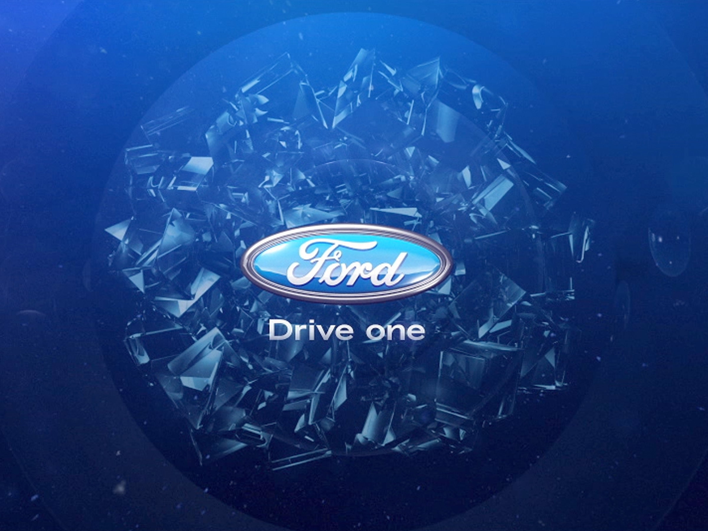 Ford Drive One campaign mark over a blue faceted sphere
