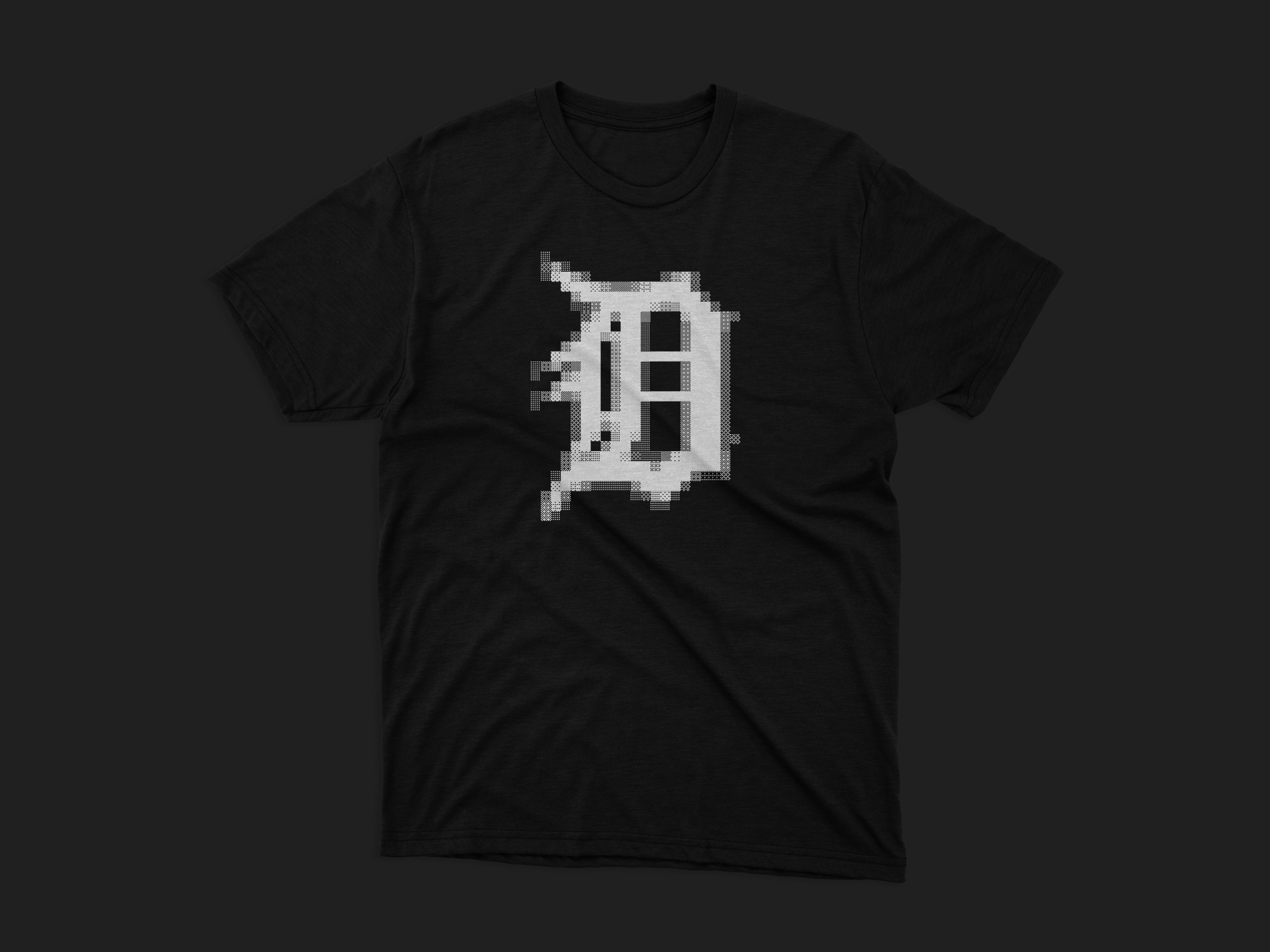 Black T-shirt mockup with a halftone Detroit D mark